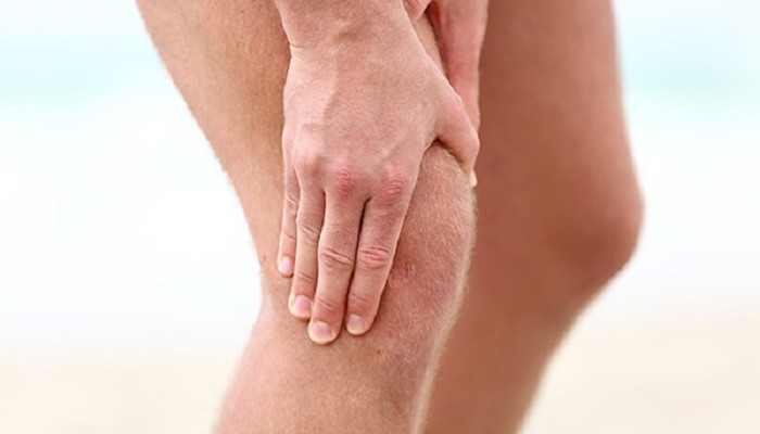 Защо краката болят над коленете пред и зад?