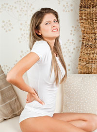 Болка в долната част на гърба по време на менструацията и пред тях