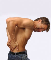 Какво причинява болка в долната част на гърба и в лявата страна?