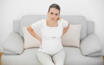 Какви са болки в гърба по време на бременност?