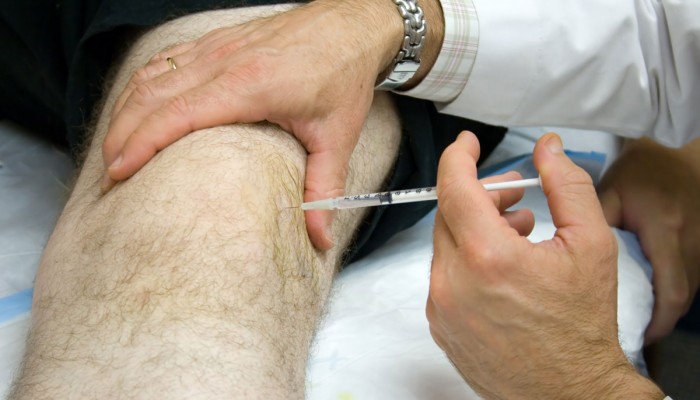 Болка в коляното с флексия и удължаване: причини, лечение