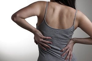 Скръбна болка в гърба - причинява