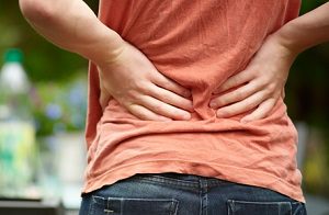 Болка в гърба по време и след ходене: с това, което те са свързани