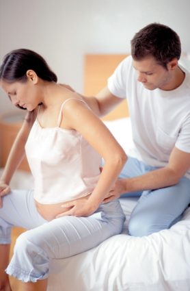 Болка в ранна бременност в долната част на гърба