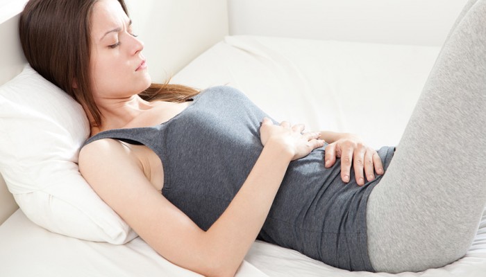 След раждането, лумбални и стомашни болки: причини
