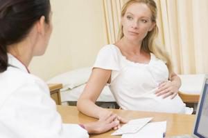 Какво означава болка в областта на скупулката по време на бременност?