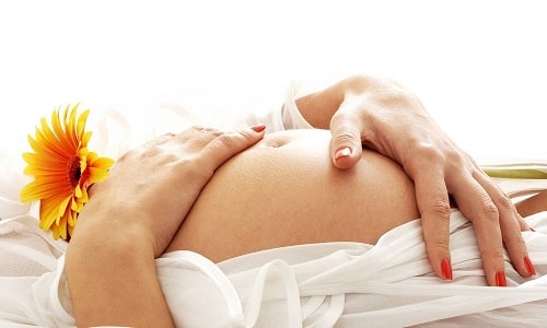 Защо ставите в ръцете и краката боли по време на бременност и след раждане?